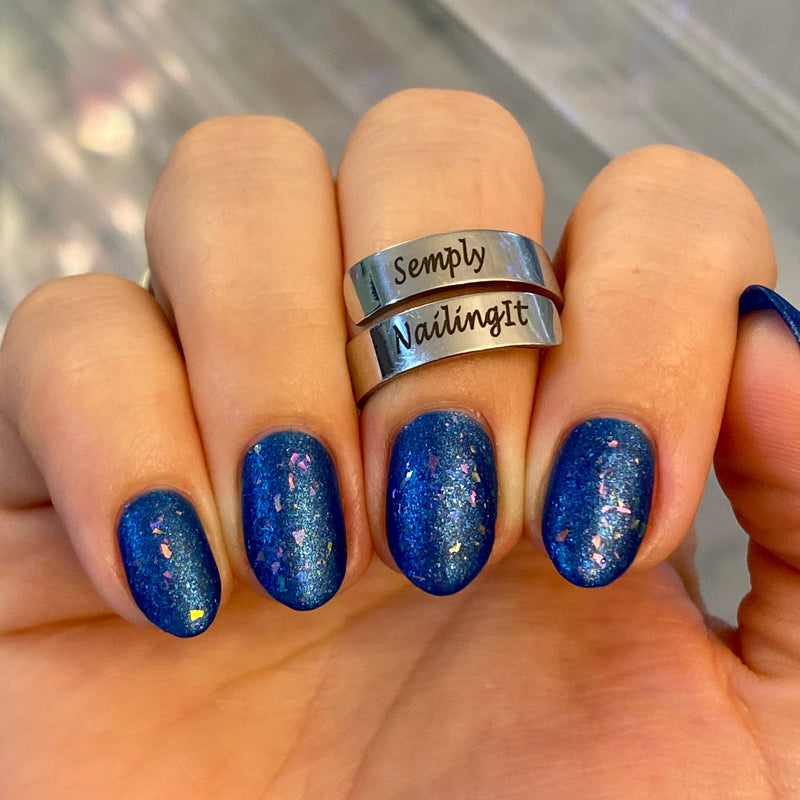 Colores de Carol - Frost-Bite the Dust Nail Polish