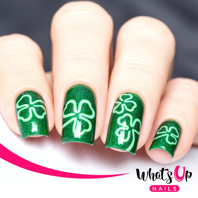 Playful Lop‑Sided Green Stencil Nails